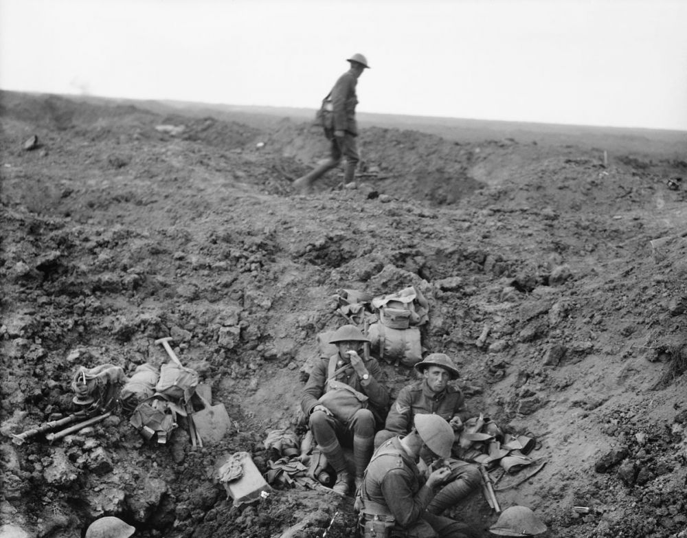 Soldiers of the 2nd Canterbury Battalion, New Zealand Division, resting in a shell hole. Battle of Flers-Courcelette, 15 September 1916.